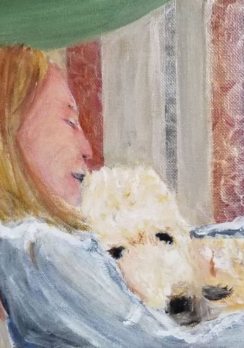 Woman and dog lounging on couch